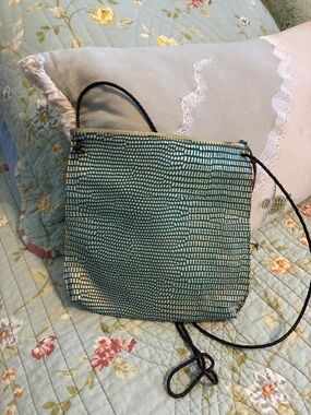 B. May Teal and Cream Patterned Crossbody Bag with Slim Strap